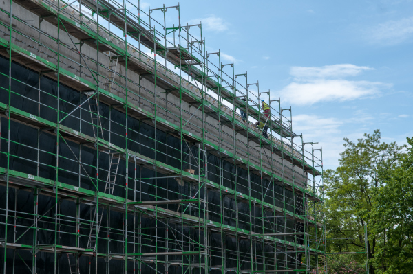 Montaż elewacji Afrykarium wykonaną z DuPont Corian, projekt ArC2 Fabryka Projektowa zdjęcie: Inter-System.